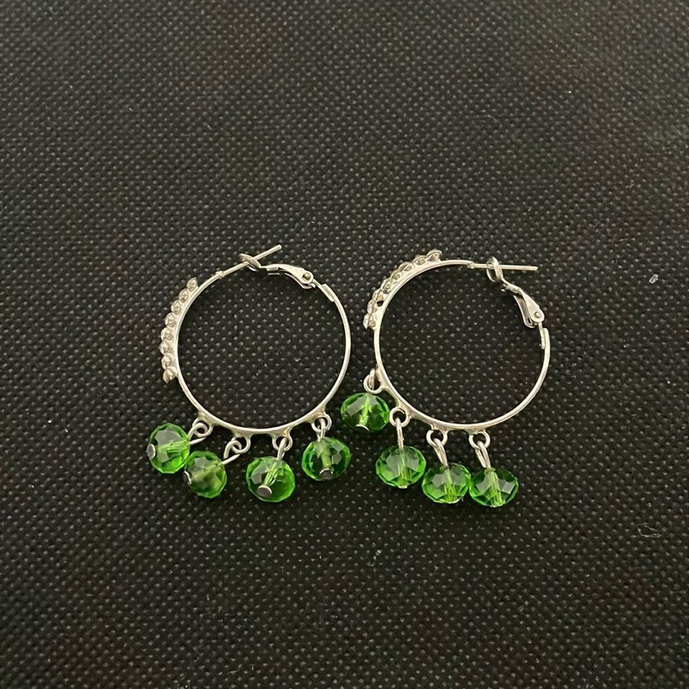Small hoop earrings with green rhinestones